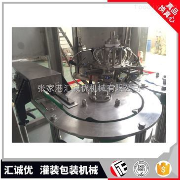 揭秘高效生產(chǎn)核心 沖洗、灌裝、封口三合一飲料包裝機(jī)